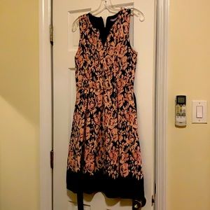 Belted rose - pink and black - patterned cocktail dress. Has pockets!
